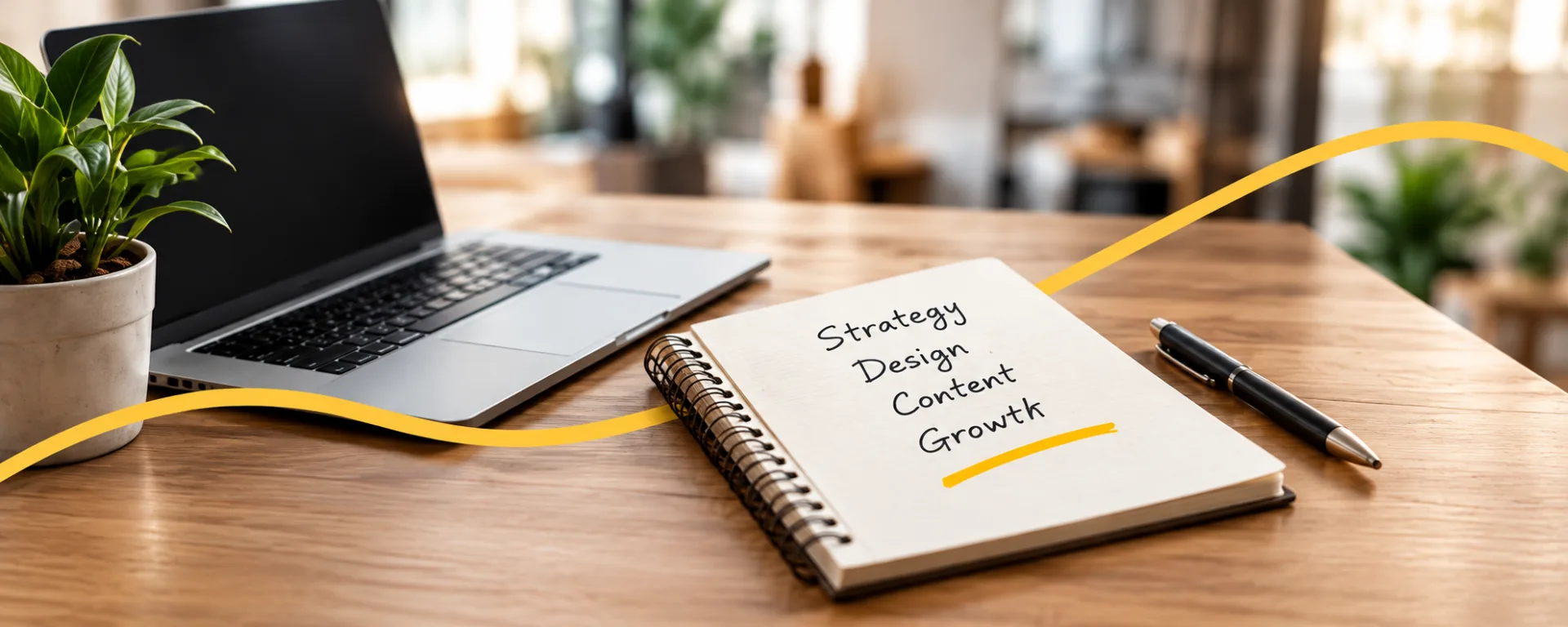 Strategy, Design, Content, Growth notebook on a desk
